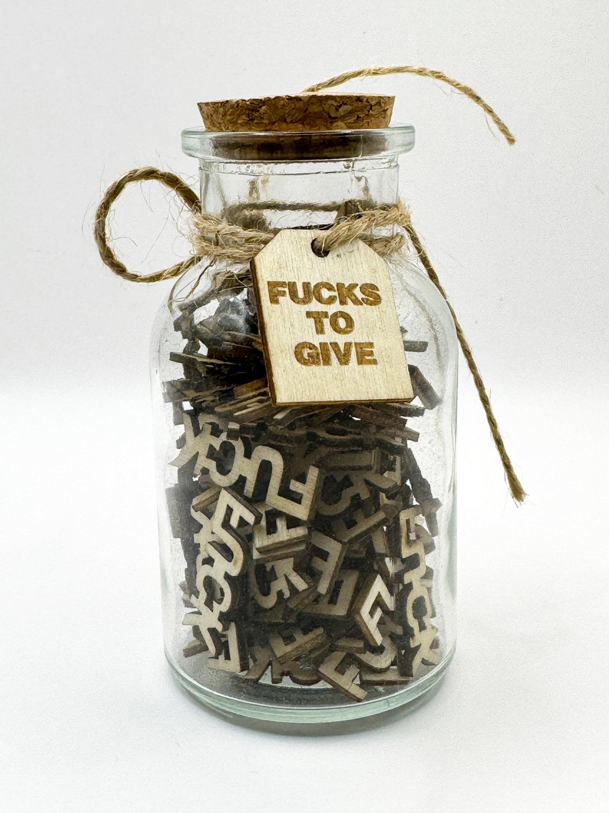 The Swear Jar filled with wooden letters to give.